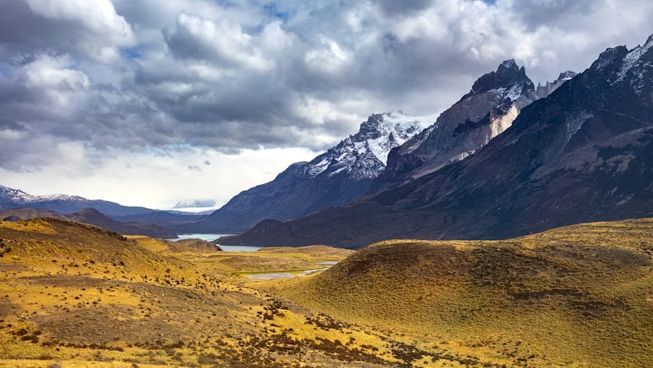 staggering view of Torres del Paine in Chile's Patagonia under dramatic skies.