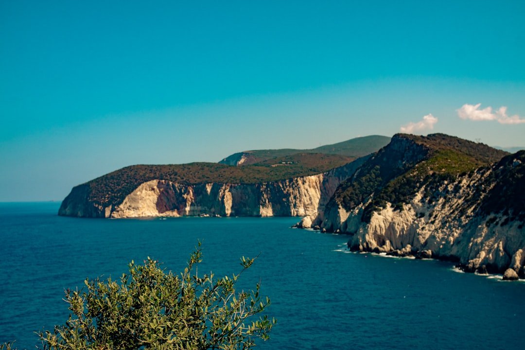 A large body of water surrounded by mountains